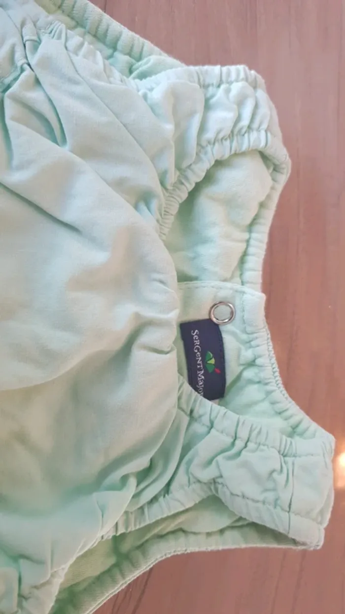 Tee-shirt sans manches vert d'eau - photo numéro 4