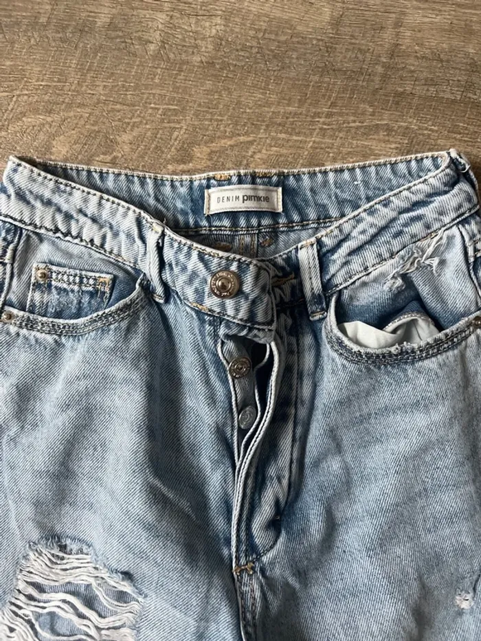 Jeans trouée - photo numéro 2