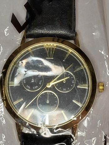 Montre pour homme noir et doré