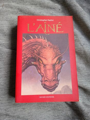l'aîné Christopher Paolini histoire de dragons