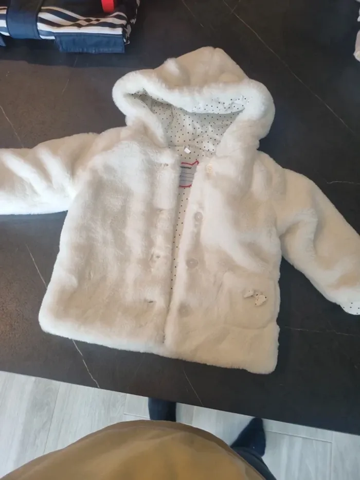 Veste fourrure neuve