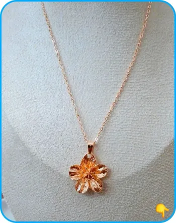 Collier fleur dorée style vintage chic été 2025