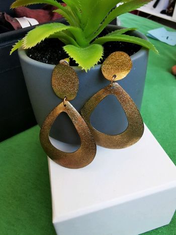 Boucles d'oreilles dorées femme