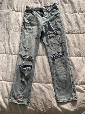 Jeans a troue taille 34