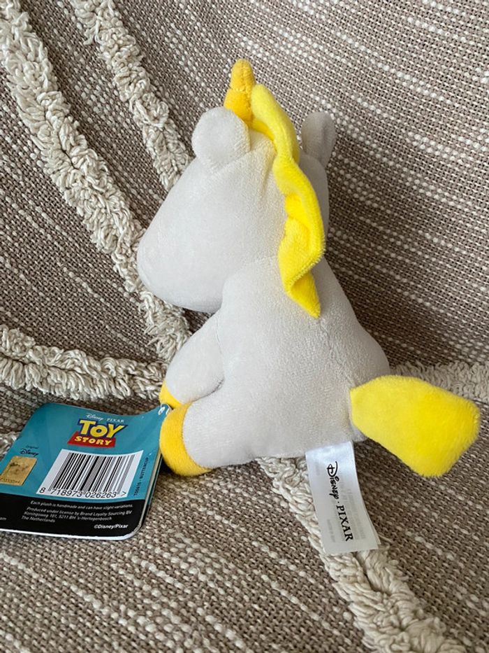 Peluche doudou 17cm Disney pixar licorne buttercup toy story gris et jaune neuve avec étiquette - photo numéro 3