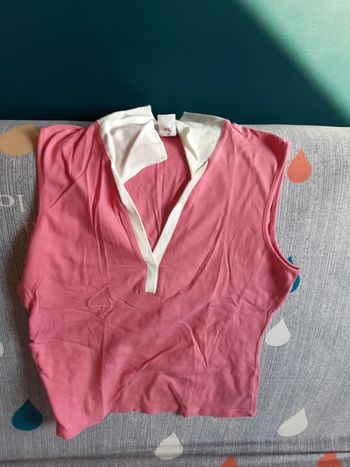 Polo sans manche neuf 42/44