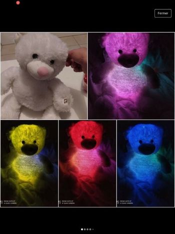 Jolie peluche toute douce   musicale et  qui change de couleurs