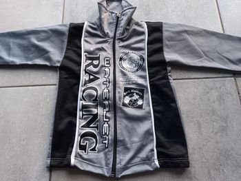 Veste de survêtement grise et noire 26 mois