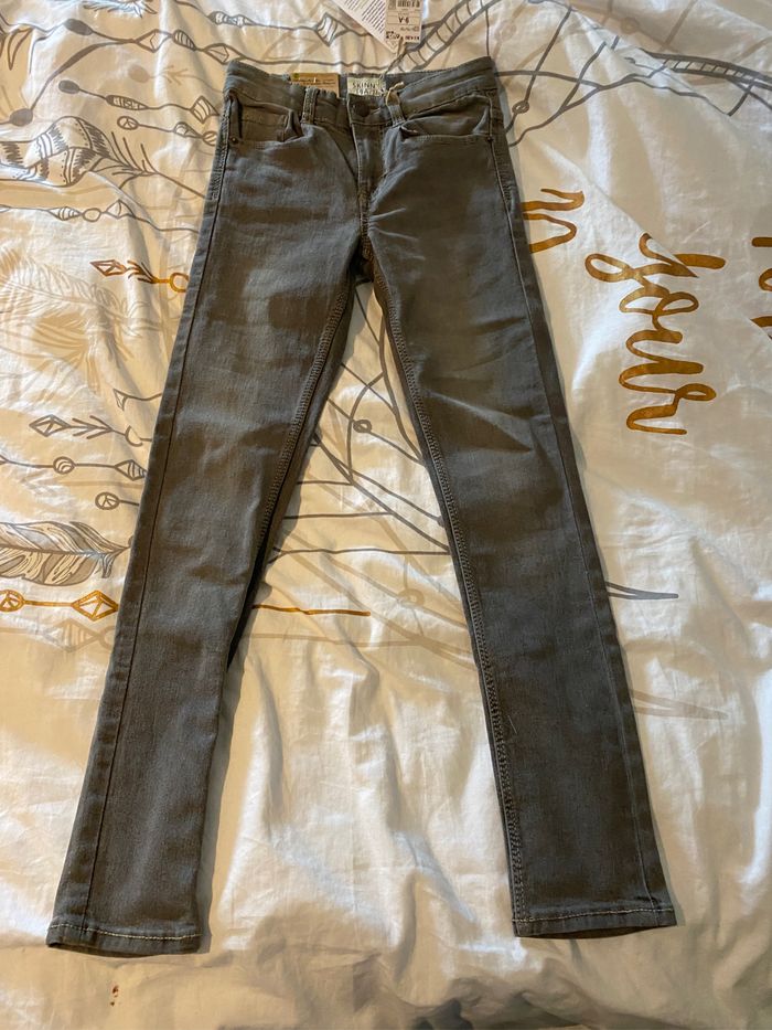 Jeans noir gris à pression kiabi skinny 9 ans NEUF