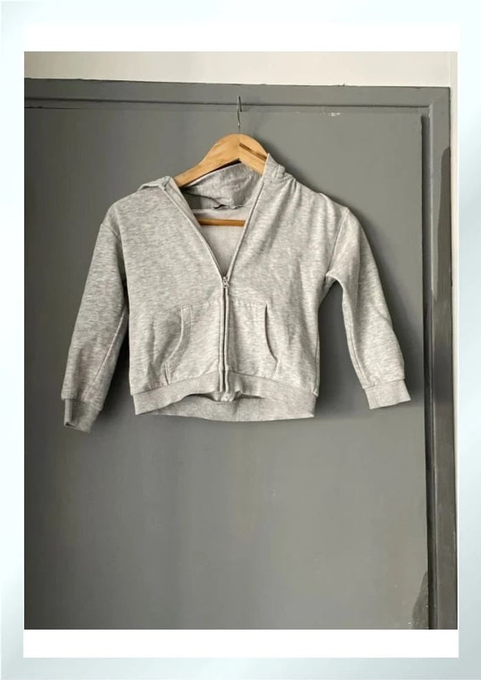 Gilet zippé à capuche 7 ans