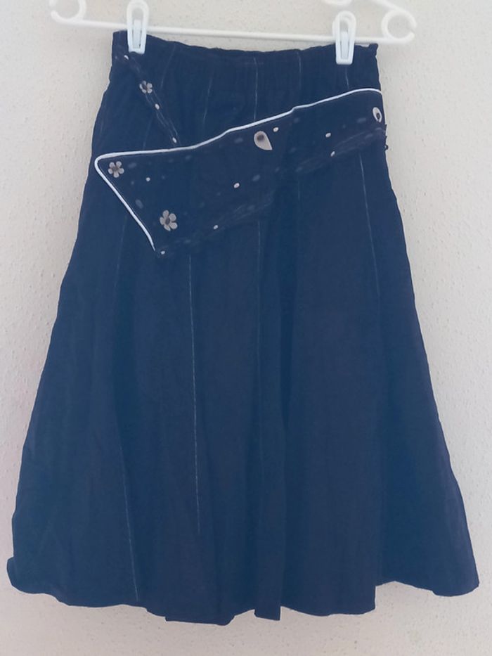 Jupe évasée brune avec motifs T: 40