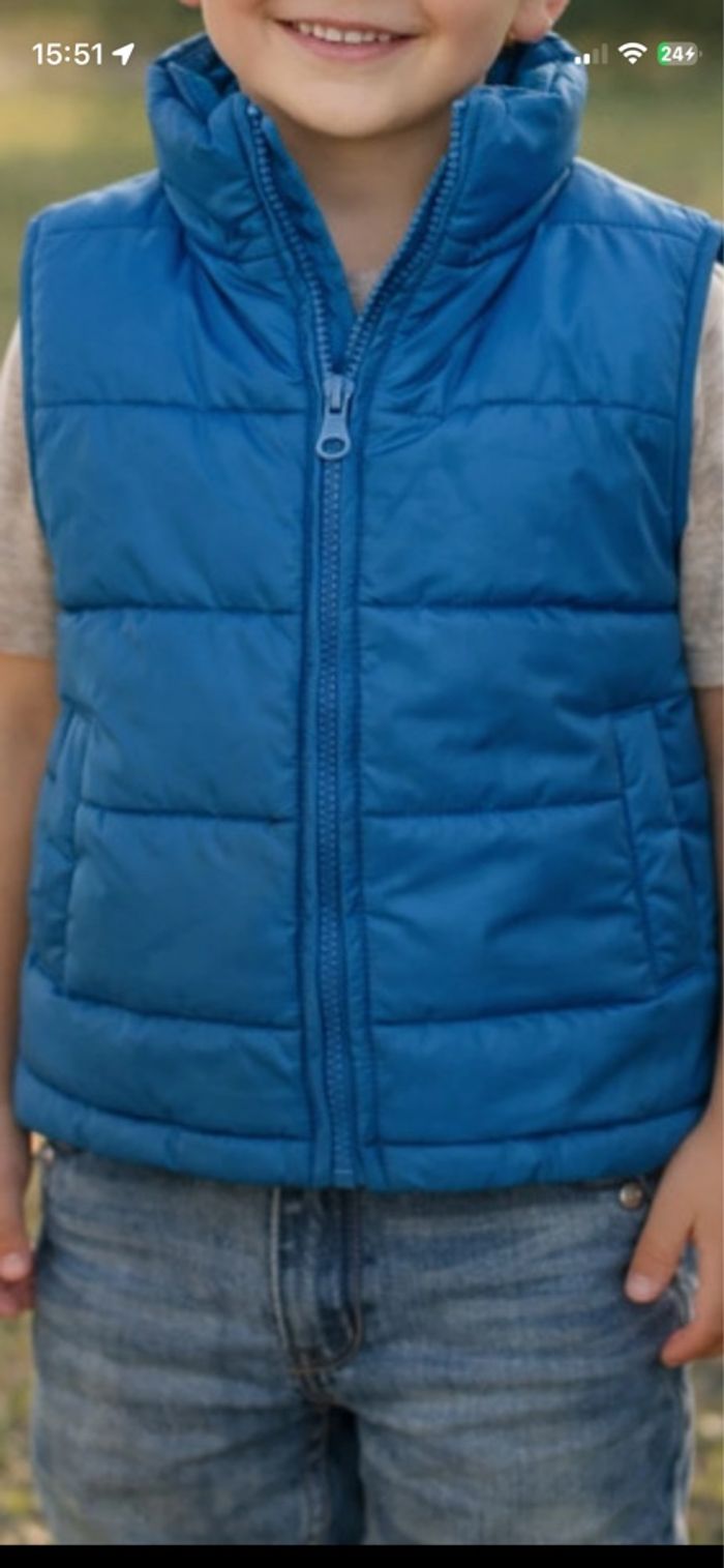 Veste sans manches neuve t.5/6 ans