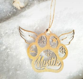 Boule de Noël patte d’animal ailes d'ange