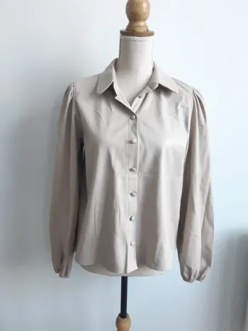 Chemise en similicuir Kiabi T38