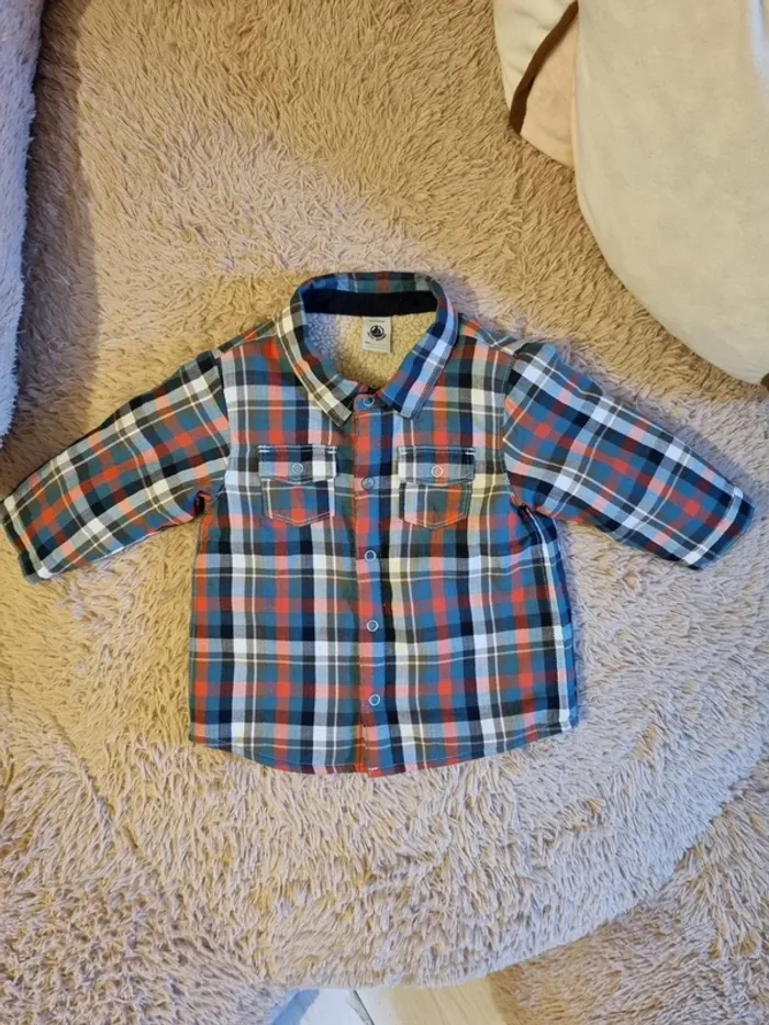 Vend petite veste molletonné à carreau 12 mois