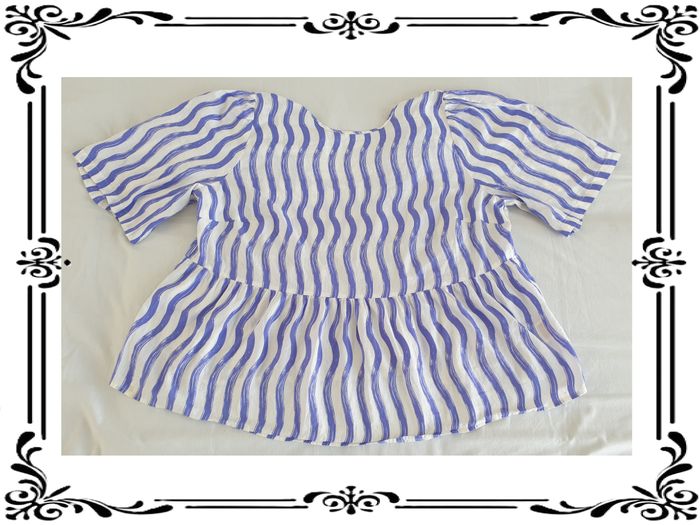 Blouse taille 50.
