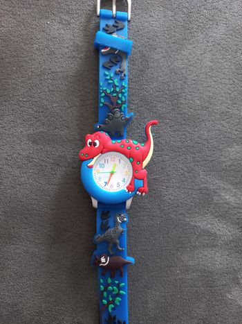 Montre enfant aiguilles dinosaure