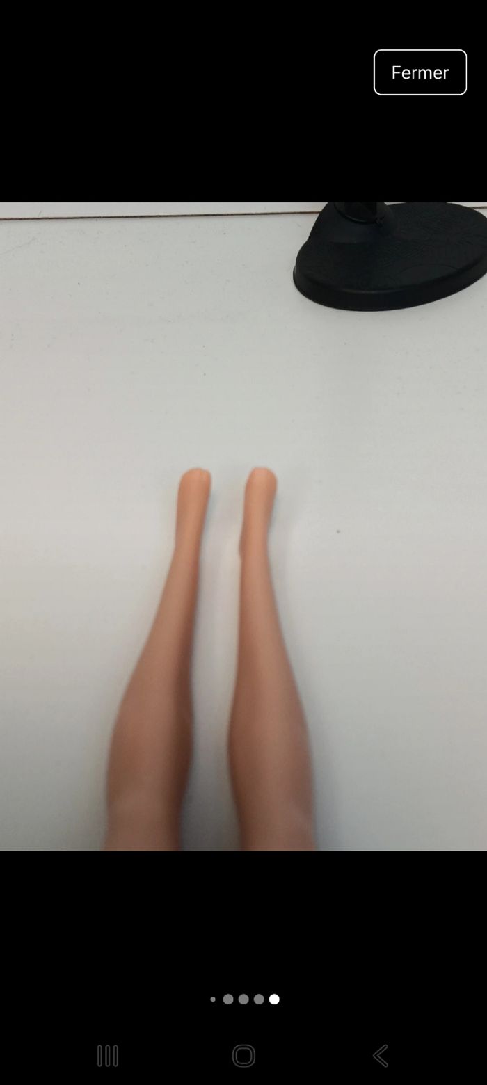 Poupée mattel barbie maillot fushia et mauve tête 2013 corp 2017 
Poupée et ensemble compris - photo numéro 7