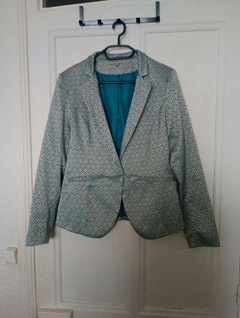 Veste bleu et dorée