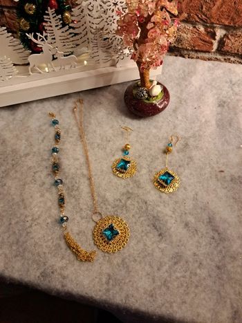 Parrurre estampes doré et strass bleu turquoise
