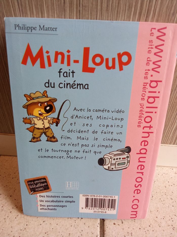 Livre bibliothèque rose mini- loup fait du cinéma - photo numéro 2
