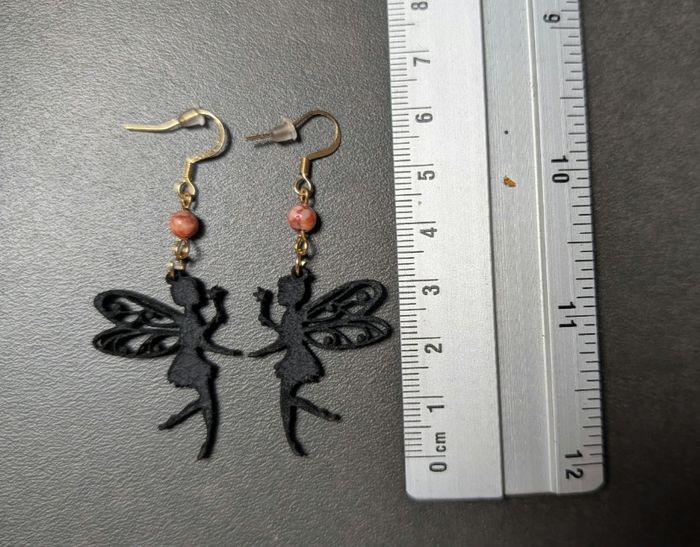 Boucles d'oreilles fées en cuir noir - photo numéro 1