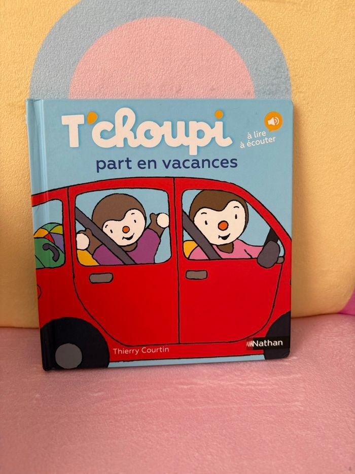 T’choupi part en vacances .