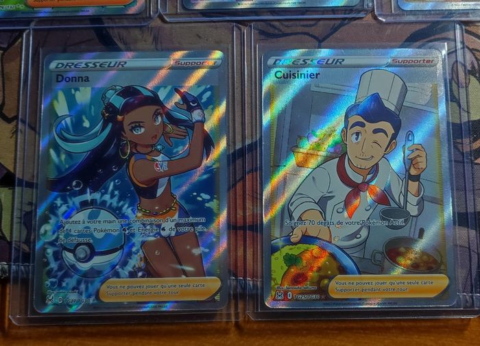 Cartes Pokémon dresseur EB et EV Donna TG27 + Cuisinier TG25 Eb11 origine perdue + Charme d'Atalante 234 étincelles déferlantes EV08 + Esprit combatif d Iris 180 EV09 + Compassion de Timmy 176 ME01 par Asmodée épée et bouclier + écarlate et violet - photo numéro 2