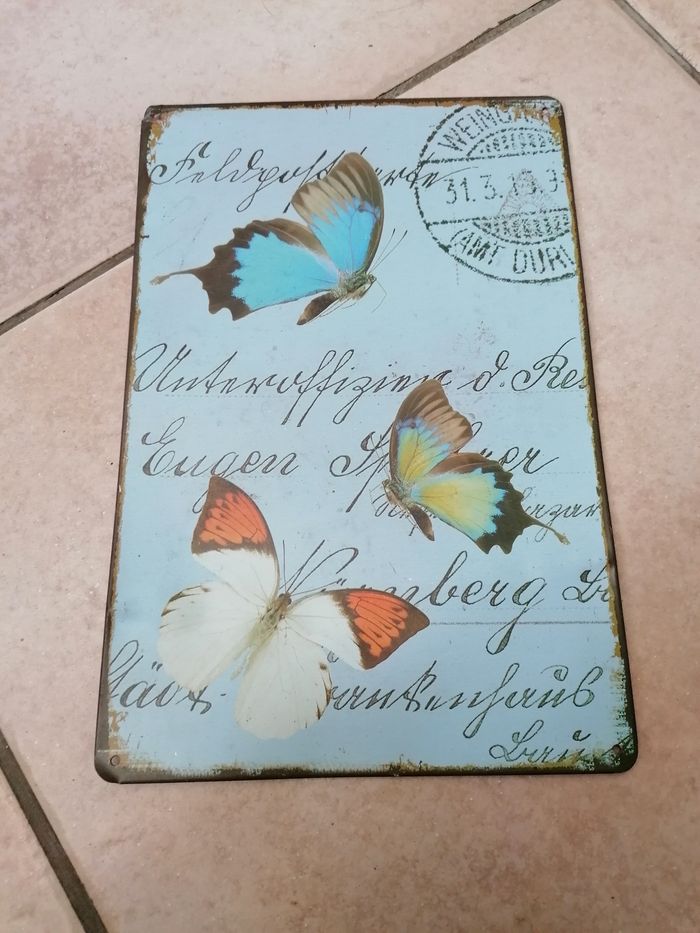 Plaque en métal papillon décoration murale
