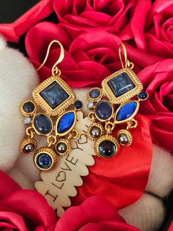 Boucles d oreilles avec ses pierres topaz bleue et autres