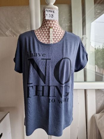 Tee-shirt, ample façon blouse, bleu à inscription noir, en très très bon état, longueur 62cm, en cot