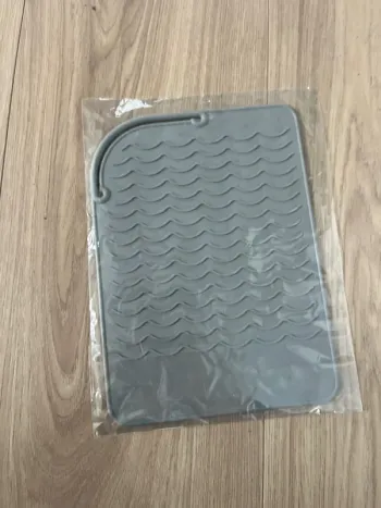 Tapis antidérapant lisseur a cheveux