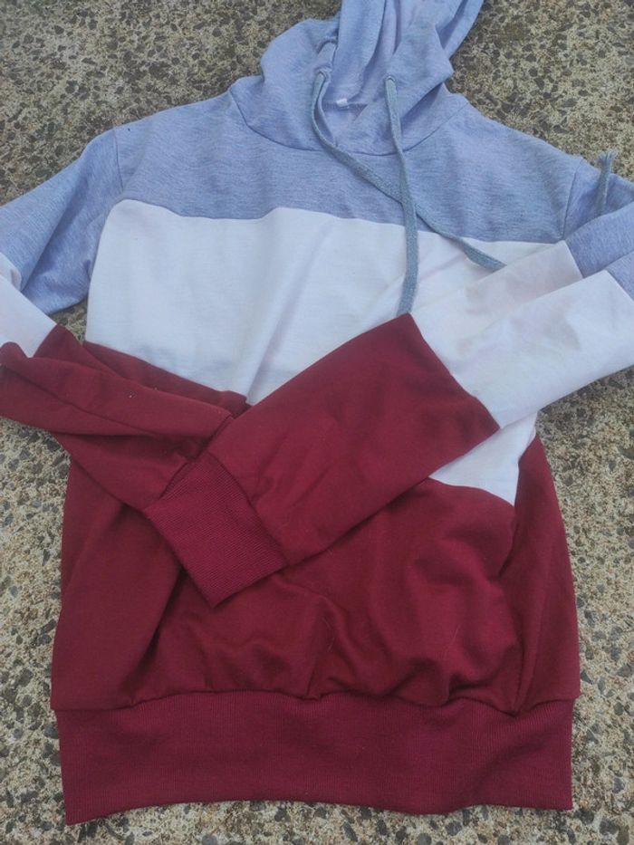 Pull taille s