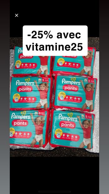 Six paquets de couches culottes taille 5