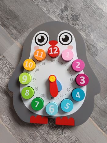 Horloge apprentissage pingouin