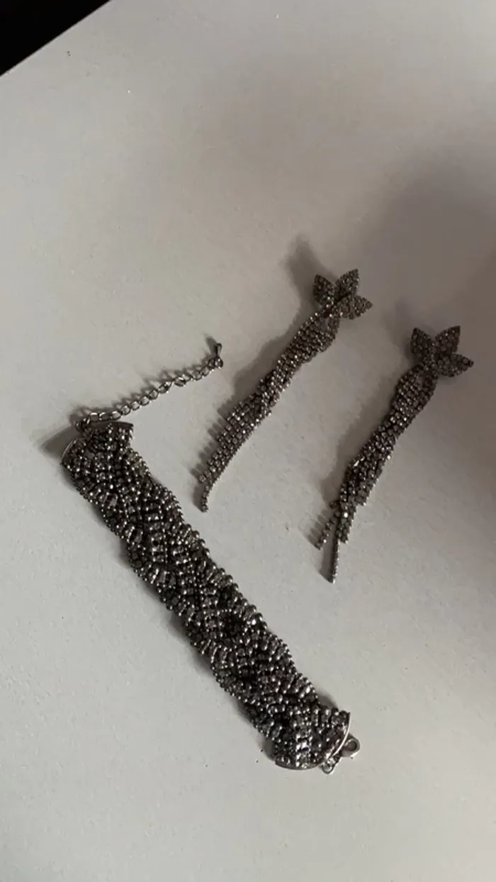 superbe ensemble boucle d’oreille plus bracelet acier