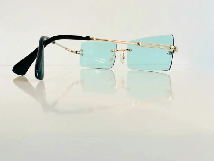 Lunette de soleil mixte percée verres verts uvprotection catégorie 2 - photo numéro 2