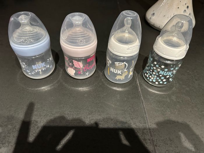 4 biberons Nuk