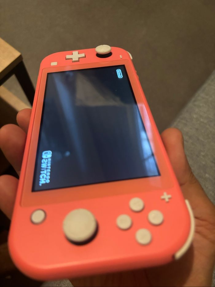 Nintendo switch lite corail - photo numéro 4