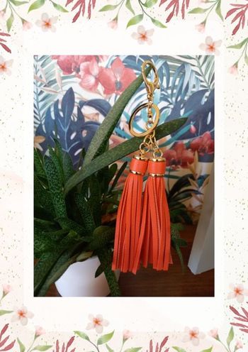 Porte clé 2 pompons orange