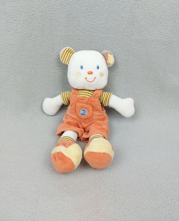 Doudou peluche ours blanc salopette orange rayures baskets Nicotoy
