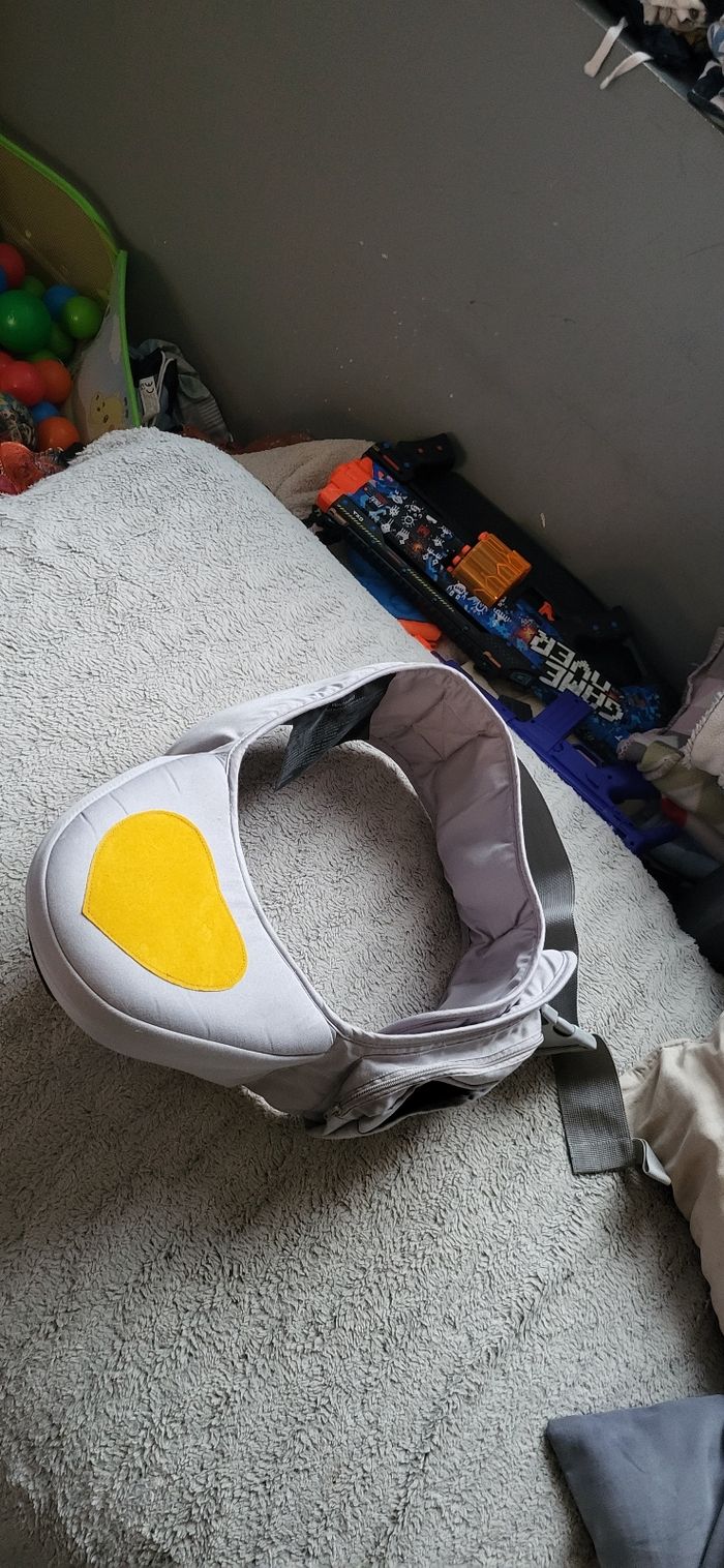 Porte bebe position assie - photo numéro 2