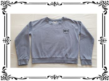 Pull court taille 36.