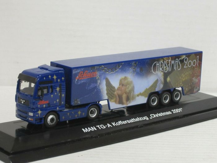 SCHUCO 22621 MAN TG-A CAMION BLEU "Christmas 2001" 1/87 - photo numéro 1