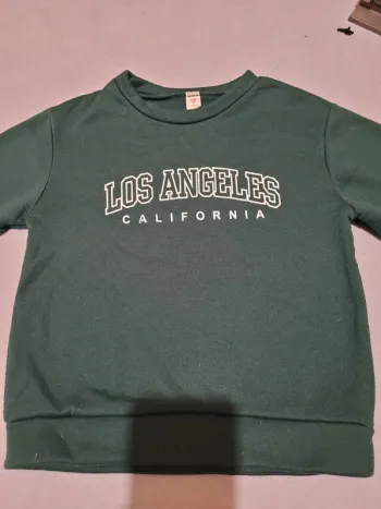 Sweat-shirt taille 7 ans