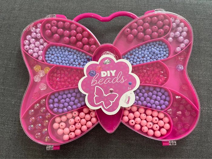 Boîte papillon avec perles