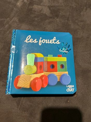 Livre à toucher les jouets