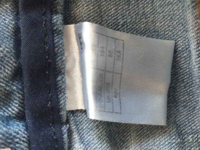 Jeans bleu effet troué - photo numéro 6