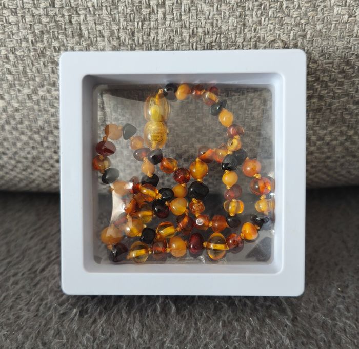 Collier ambre bébé - photo numéro 2