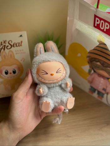 The Monsters « HEHE » Labubu Have a Seat Pop Mart